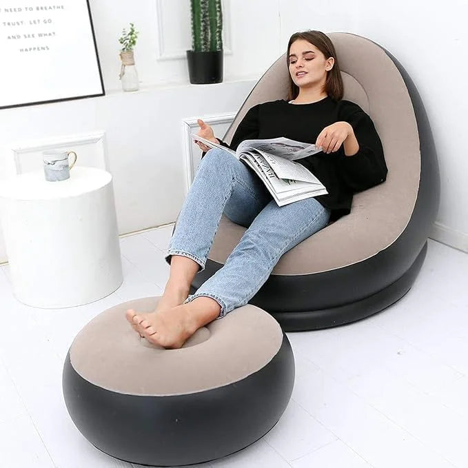 Portable inflatable sofa chair with matching footstool for convenient seating anywhere